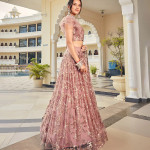 Peach-Coloured & Gold-Toned Embellished Sequinned Semi-Stitched Lehenga & Unstitched Blouse With